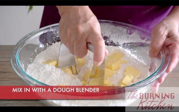Kneading butter and flour mixture with dough blender
