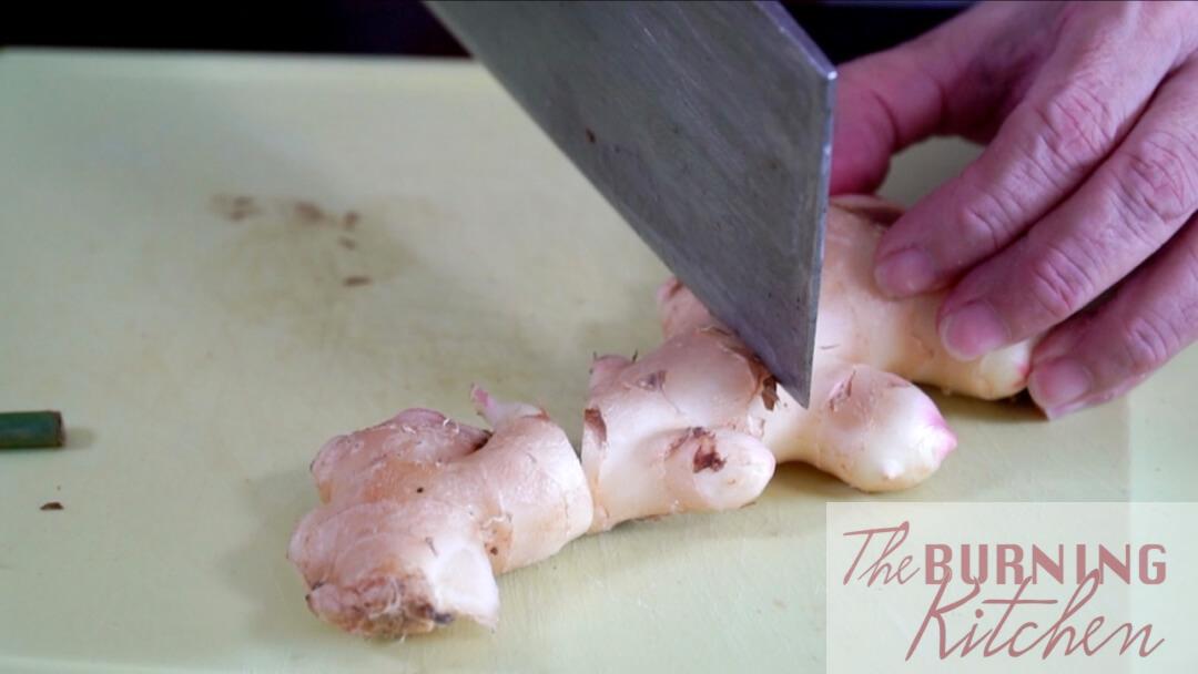 Cutting the young ginger into chunks